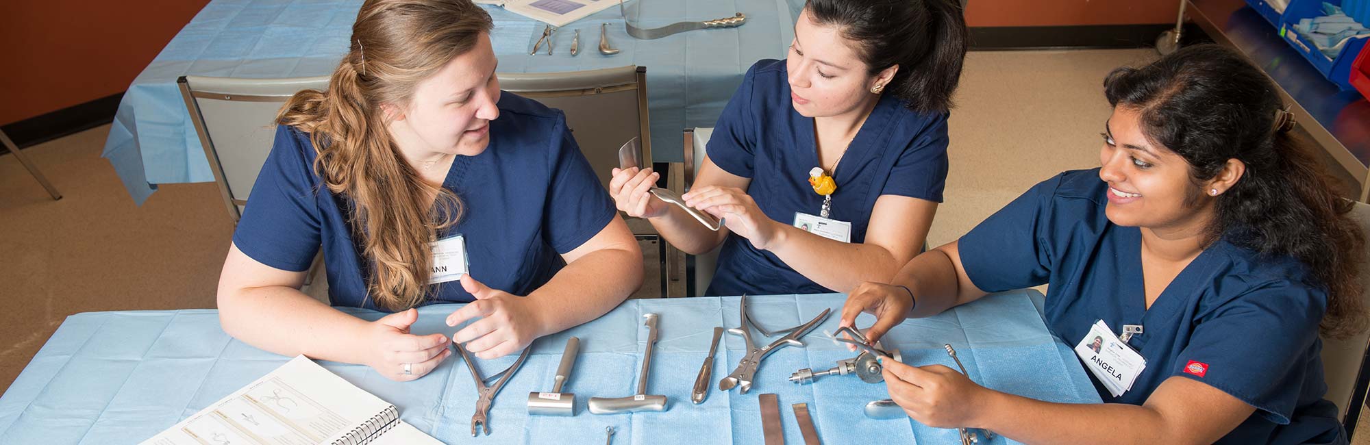 students working with surgical tools